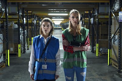 Megan Roberts (AIMEE-FFION EDWARDS), Alys Morgan (POPPY LEE FRIAR) in Life and Death in the Warehouse (Image Credit: ý/Simon Ridgway)