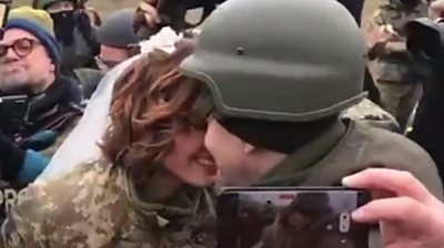 A Ukrainian couple get married on the frontlines