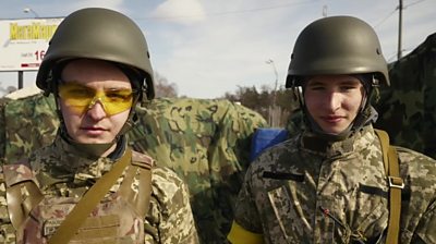 Two teenage soldiers