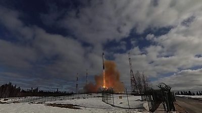 Missile launching in a snowy landscape