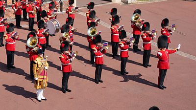 The guard play Happy Birthday for the Queen