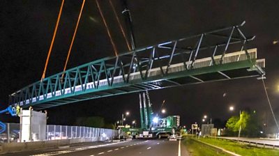 Pedestrian footbridge installed across A45