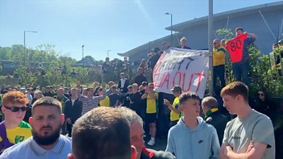 Norwich City fans with 'Delia out' banner