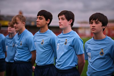 Batzy (LAWTON DICKENS);Ash Stevenson (MOHAMMAD SAKHI);Andy Woodward (MAX FLETCHER);Jobbo (FRANKIE FRIEND) in Floodlights (Photo credit: Credit: BBC/Expectation TV/Matt Squire)