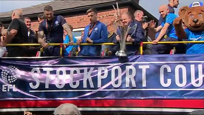 Open top bus parade of trophy