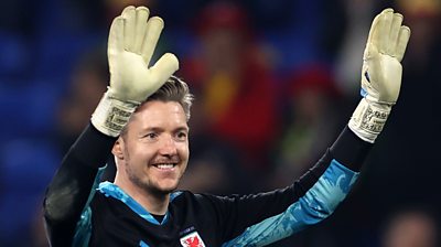 Wayne Hennessey raises his arms and smiles