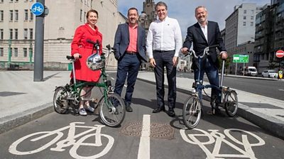 Rosslyn Colderley, Chris Boardman, Steve Rotherham, and Simon O'Brien on the Strand on 24 May 2022