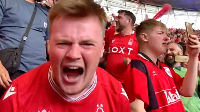 Fans celebrate after Nottingham Forest secured promotion to the Premier League