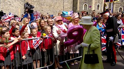 Queen Elizabeth and Prince Charles with crowd