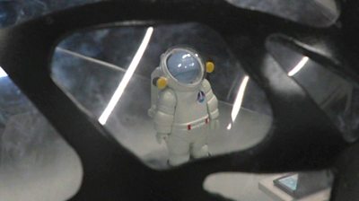 A model of an astronaut inside a scale model of a graphene-based space habitat