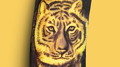 A banana turned into an image of a tiger