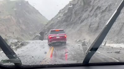 Car hit by rockslide in Yellowstone National Park.
