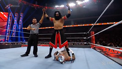 Veer Mahaan celebrates winning his match over Rey Mysterio