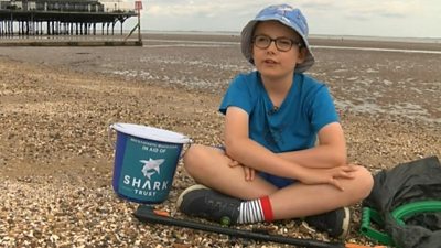 Max, 10,  is cleaning litter for 24 hours from beaches
