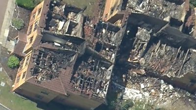 Helicopter shot of Bedford flats gas explosion