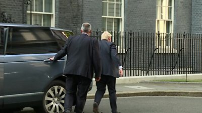PM enters Downing Street