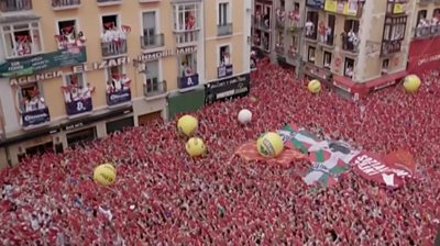 Thousands of people on the streets of Pamplona
