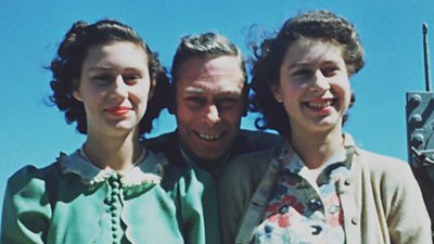 Princess Margaret and Princess Elizabeth with their father King George