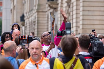 Sir Lenny Henry takes part in The Queen's Baton Relay as it visits Birmingham