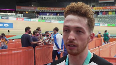 Will Roberts celebrates a bronze medal in the men's scratch race after an earlier crash left him 'shook up'.