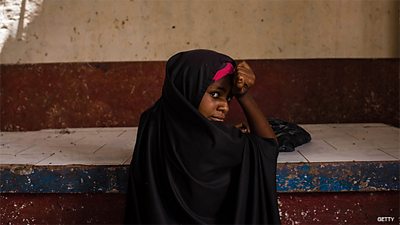 A girl pictured in a produce market in Barawe, Somalia