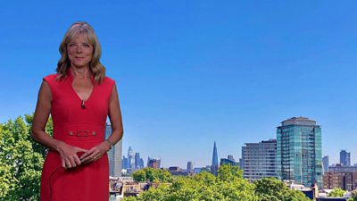 Louise Lear in front of a green screen of London