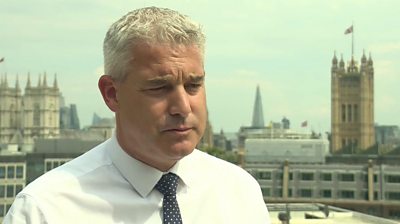 Steve Barclay, Secretary of State for Health and Social Care standing outside near Parliament