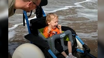 Boy in special wheelchair