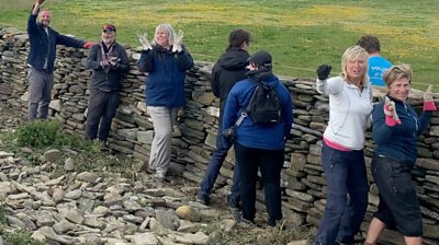 The festival draws volunteers from around the world and offers dyke building, workshops, music and a ceilidh.