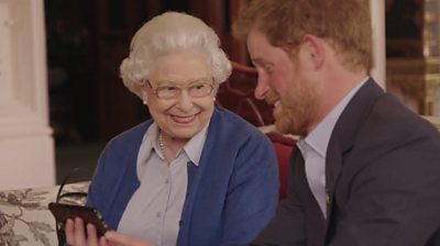 The Queen and Prince Harry smiling