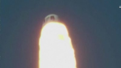 Blue Origin capsule firing thrusters