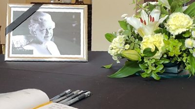 A book of condolence has been opened at Government House