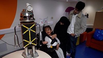 Robot with Hamza, Ginger and Syed