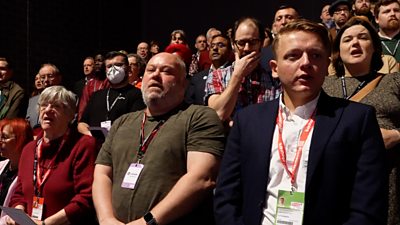 Labour members sing national anthem