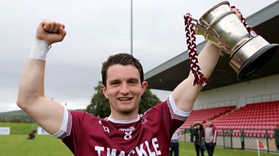 Slaughtneil's Cormac O'Doherty lifts the trophy