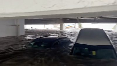 Cars submerged in car park