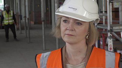 Liz Truss wearing a hard hat