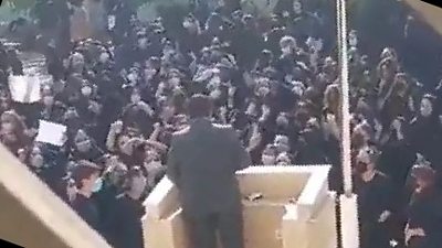 Students protest paramilitary visitor in Iran