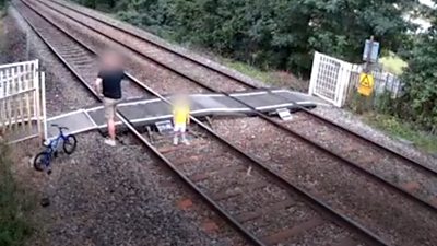 CCTV footage shows people behaving 'recklessly' on level crossing