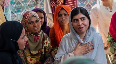 talks with people affected by floods in Dadu district, Sindh province, Pakistan