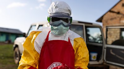 Ugandan Red Cross workers with PPE