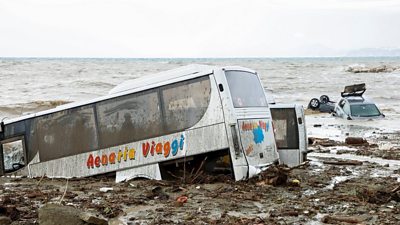 A coach trapped in mud in Ischia