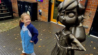 Carrie with a statue of Matilda