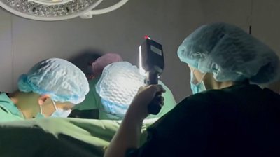 Surgeons operating in the dark