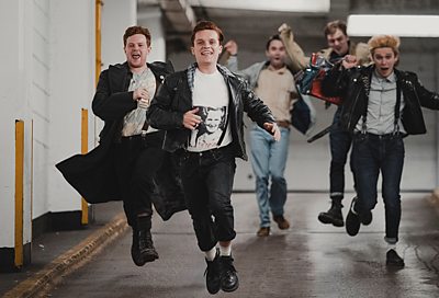 Limbo (MATT LITTLESON), Young Tully (TOM GLYNN-CARNEY), Young Jimmy (RIAN GORDON), Young Tibbs (MITCHELL ROBERTSON), Young Hogg (PAUL GORMAN) in Mayflies (image credit: Credit: BBC/© Synchronicity Films Photographer: Jamie Simpson)