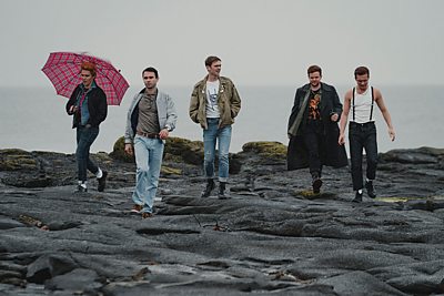 Young Hogg (PAUL GORMAN), Young Jimmy (RIAN GORDON), Young Tibbs (MITCHELL ROBERTSON), Limbo (MATT LITTLESON), Young Tully (TOM GLYNN-CARNEY) in Mayflies (image credit: Credit: BBC/© Synchronicity Films Photographer: Jamie Simpson)