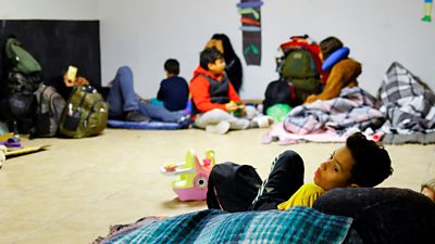 Migrants in shelter