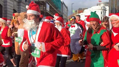 Santas running through Douglas