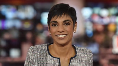 Reeta Chakrabarti is shown in a grey jacket sitting in the  studio