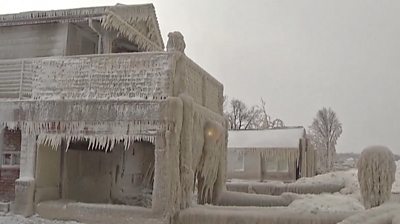 Icicles cover a house in New York state